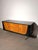 Striking 1950s rockabilly sideboard with a characteristic mid-century design combining warm wood tones, a contrasting...