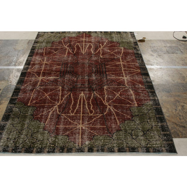 Hand-knotted in wool from Turkey circa 1960-1960l, a 5x8 mid-century modern rug in art deco style from Rug & Kilim’s...