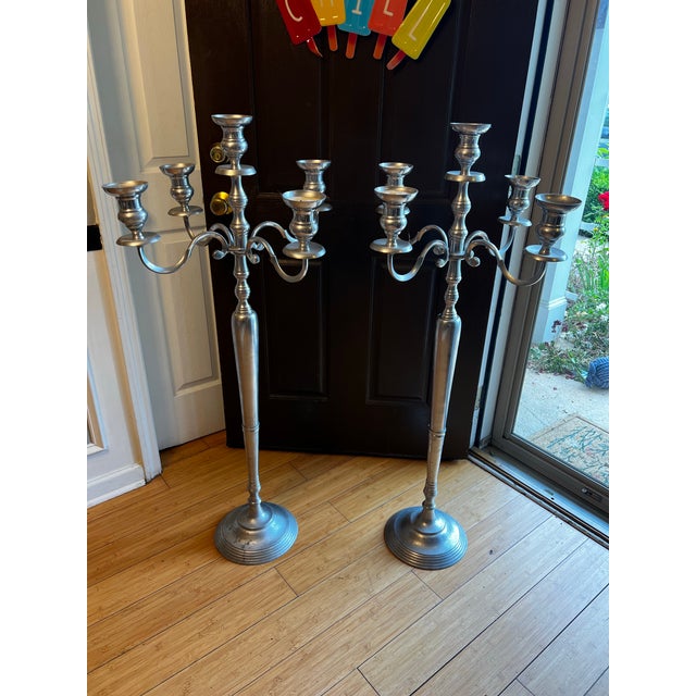 Up for consideration is a beautiful vintage pair of oversized silver candelabras. These would look lovely in your home,...