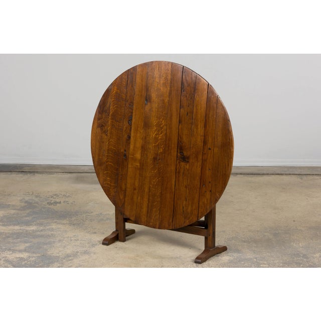 A charming mid 19th-century French Provincial vendange (wine tasting) table, sourced in Provence. Hand-crafted from solid...