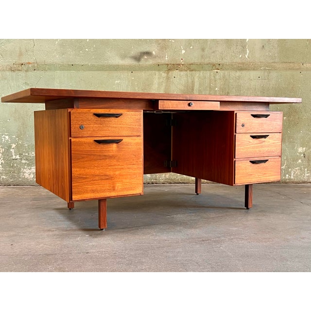 This Jens Risom 72” executive desk is in beautiful condition and has a unique, custom-made center drawer commissioned by...