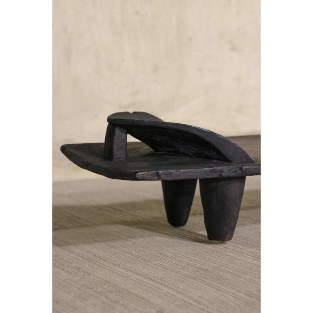 This hand-carved Senufo bed is an extraordinary piece rooted in the artistic heritage of the Senufo people of West Africa,...