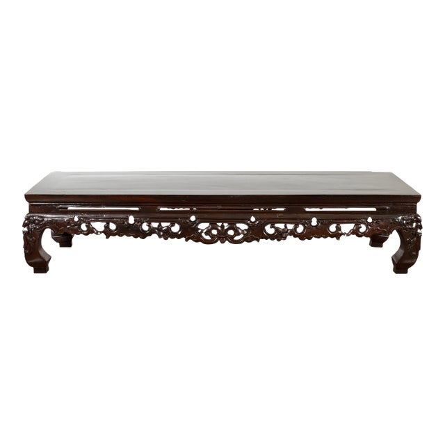 Chinese Qing Dynasty Low Kang Coffee Table with Carved Apron and Dark Lacquer For Sale