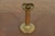 A gorgeous Arts & Crafts period brass finished hand hammered copper candlestick By Roycroft (signed with impressed orb and...