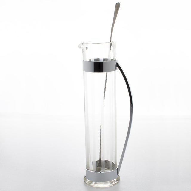 Boost your cocktail experience with this rare American Art Deco masterpiece, a stunning creation by Hawkes Inc. The piece...