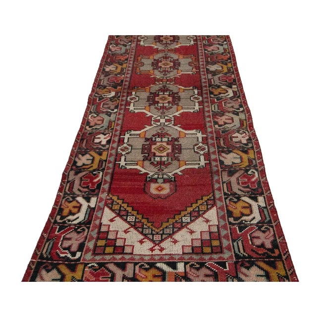 Vintage handknotted runner rug from Konya region of Turkey. Approximately 50-60 years old. In very good condition.