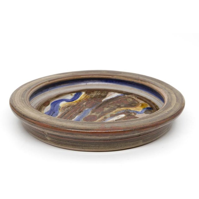 Vintage Scandinavian studio pottery bowl from the 1970s. Hand-thrown ceramic with expressive abstract glaze in earthy...