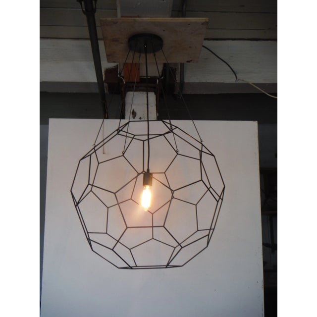 This stunning chandellier is in the shape of a truncated icosahedron. Tediously assembled and finished over the course of...