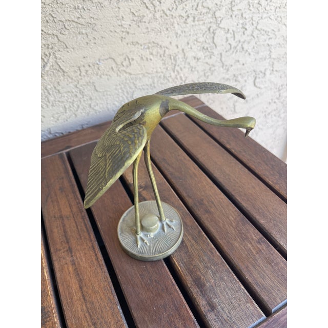 This pair of mid-century Korea brass cranes features long, elegant legs and intricate detailing, capturing the grace of...