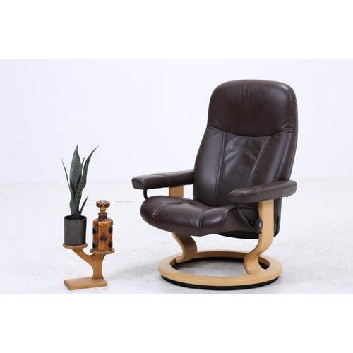 Stressless “Consul” recliner with footstool in a classic, understated form and clean Scandinavian lines. Leather, wooden...