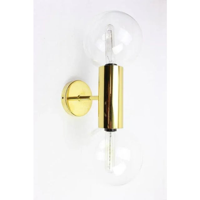 Wonderful pair of sputnik brass wall sconces designed by motoko ishii made for staff leuchten, manufactured in germany,...