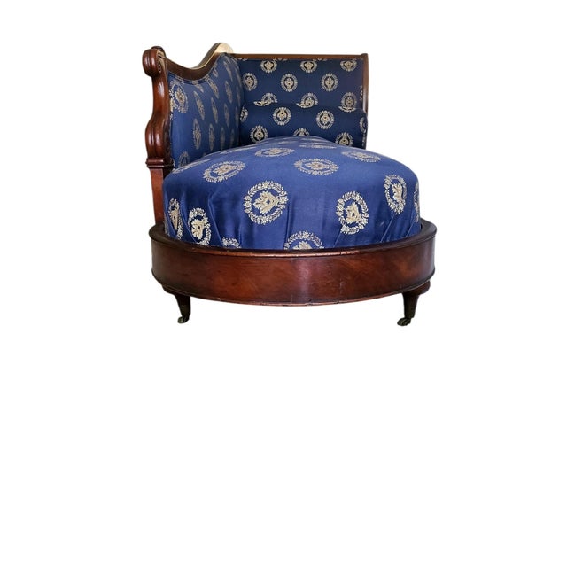 This is an antique chaise longue (specifically a méridienne style) that draws heavily from both French Empire and English...