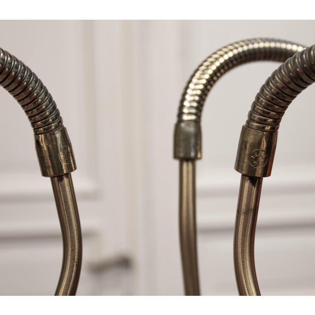 1940s brass floor lamp with a solid bronze base. The lamp features three adjustable arms, each fitted with its original...