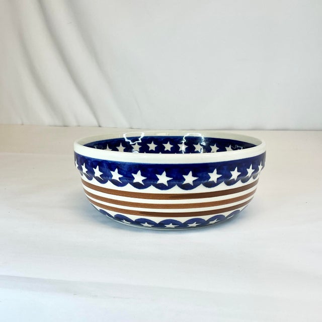 From our private collection. This is a hand-painted Round Serving Bowl from Boleslaeiec Pottery. The pattern is Americana...