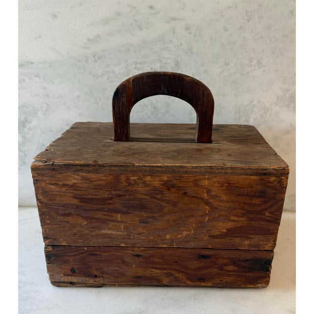 Primitive wood toolbox or sewing box has all the charm from years of use. Box has partitioned sections in the interior and...