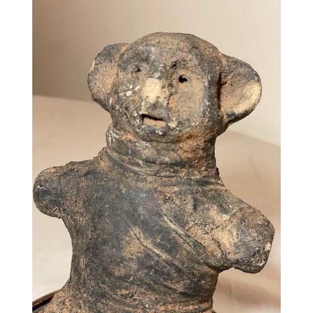 This antique 19th century terracotta Makonde fetish doll figure from Tanzania, East Africa is a beautiful and unique...