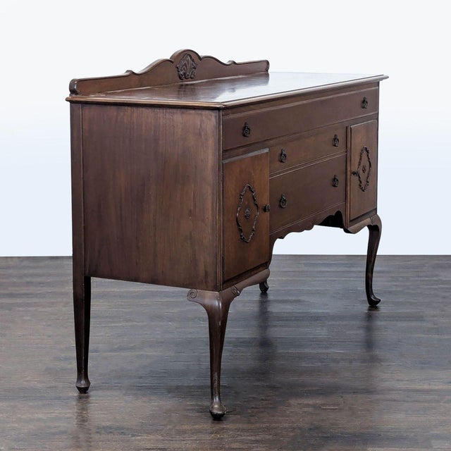 This classic sideboard features solid wood construction and elegant carved details. It comes with two large cabinets,...