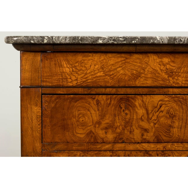 Sourced in Provence, France, this mid-19th century Louis Philippe commode is veneered in richly figured walnut and retains...