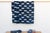 A masterwork of Malian textile heritage featuring deep indigo saturation and symbolic geometric motifs. Originating from...