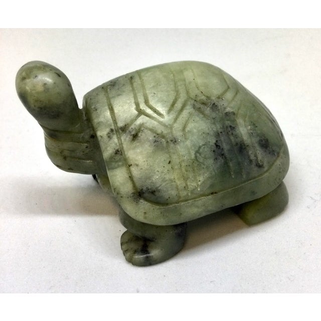Very nice representation of carved spinach jade. We love the cute turtle and how he keeps his eyes on things. Gift worthy...