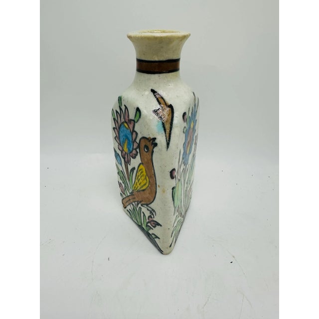 Such a pretty vase, three hand painted sides, all with different patterns.