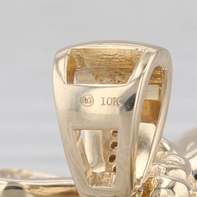 Gemstone Information: - Natural Diamonds - Total Carats - 0.10ctw Cut - Single Color - F - H Clarity - SI1 - I3 Metal: 10k...