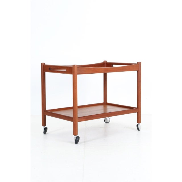 Andreas Tuck “AT-45”, Design: Hans Wegner, Denmark, 1950s-1960s. Teak (veneer and solid parts). Very high-quality...