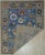 This blue wool rug features a hand knotted pile weave and is designed in the Nain style. It displays a classic traditional...