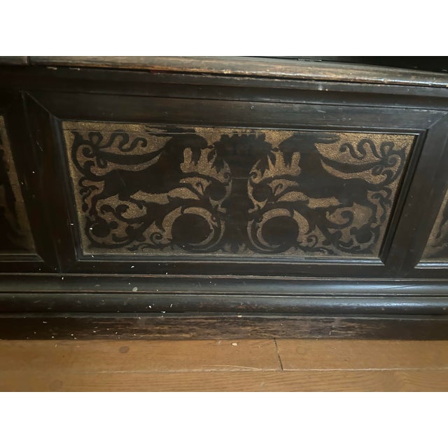 Beautiful Italian walnut entryway bench with depictions of animals and mythological figures the bench consist of two...
