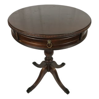 Vintage Mid-Century Regency Mahogany Drum Table With Carved Paw Feet For Sale