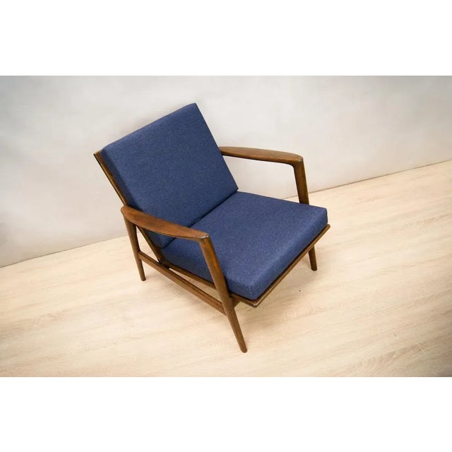 The armchair was produced by the Polish company Swarzędzka Furniture Factory. Has been professionally restored and...