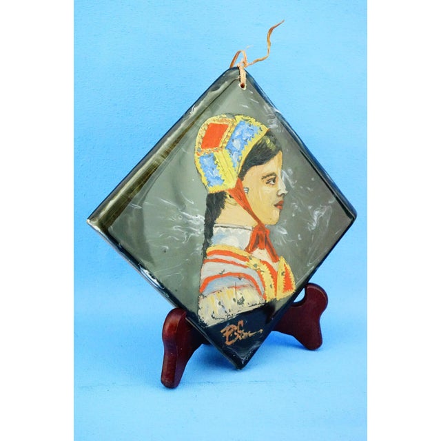 Measurements: height: 15 cm; width: 15 cm; depth: 1 cm square, diamond-shaped ceramic tile, entirely hand-decorated,...