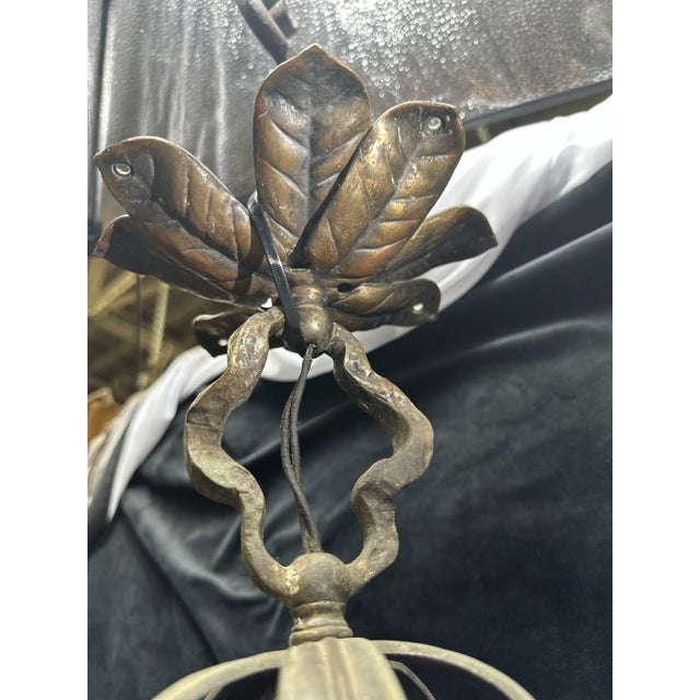 This exquisite antique pendant light beautifully blends the timeless appeal of the Arts and Crafts movement with the...