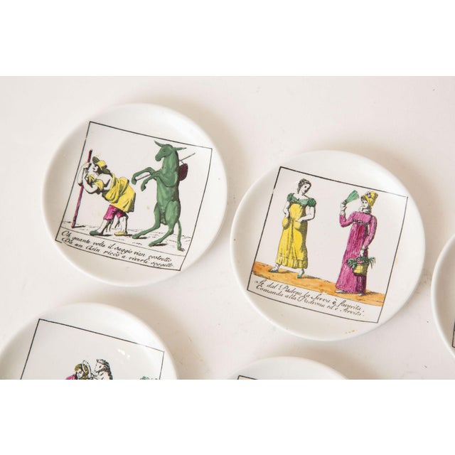 Mid-Century Modern Vintage Piero Fornasetti Porcelain Colored Opera Coasters Il Mondo Alla Rovescia Set of 8 Italian MCM For Sale - Image 3 of 12