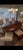 Traditional regency style hardwood dining table and 8 Queen Anne style upholstered high back chairs, includes two arm...