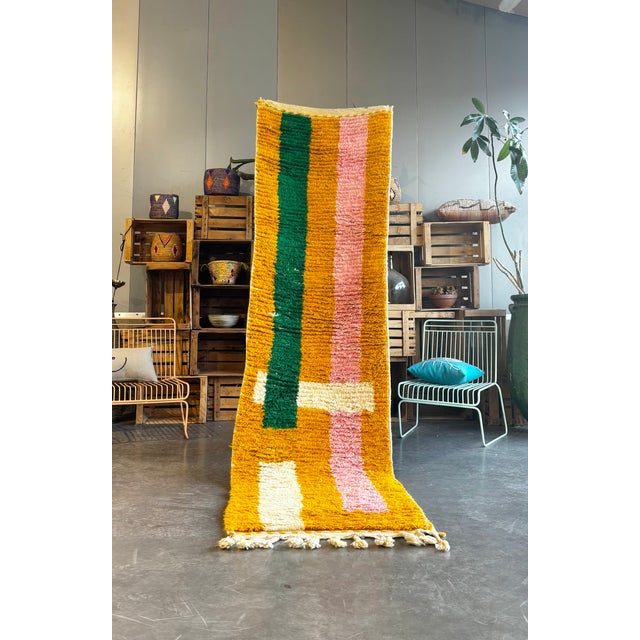 This authentic Moroccan Boujad runner rug was handwoven in the Middle Atlas region using natural wool. Boujad rugs are...