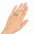 Elegant 14K rose pink gold cocktail engagement ring featuring a 1.7 carats natural oval morganite center, accented with...