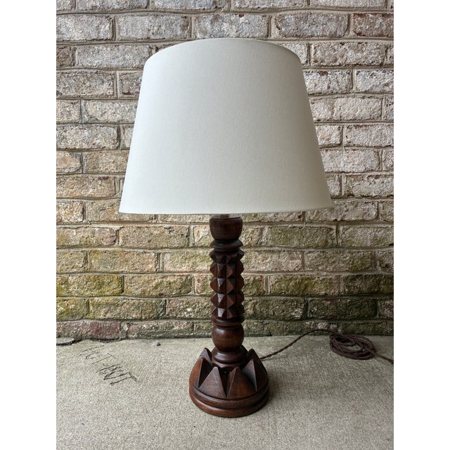 Carved wooden table lamp by Charles Dudouyt, France 1940s. This piece has been newly re wired to operate in the states,...