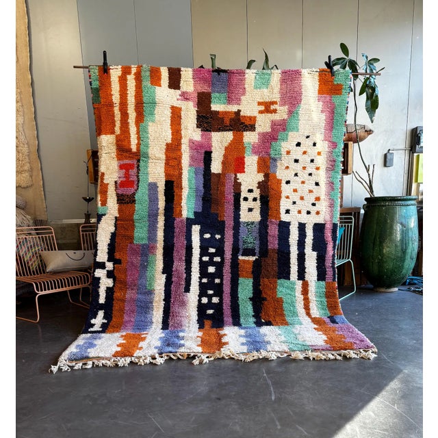 This stunning Moroccan Boujad rug 200x300 cm is a true statement piece designed to transform your interior into a warm,...