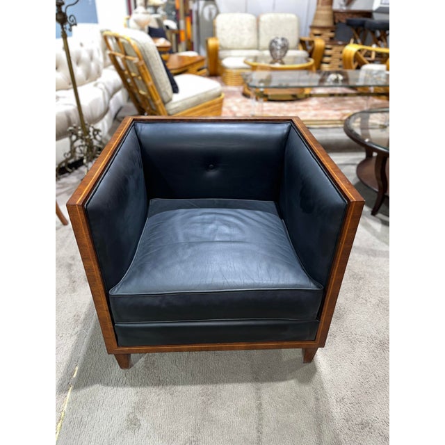 The Jonathan Charles Woven Wood Club Chair is a masterful blend of luxurious materials and meticulous craftsmanship....