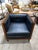 The Jonathan Charles Woven Wood Club Chair is a masterful blend of luxurious materials and meticulous craftsmanship....