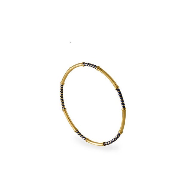 The Thin Bangle with Striped Enamel Details is 100% created in NYC, supporting local artisans and independent jewelry...