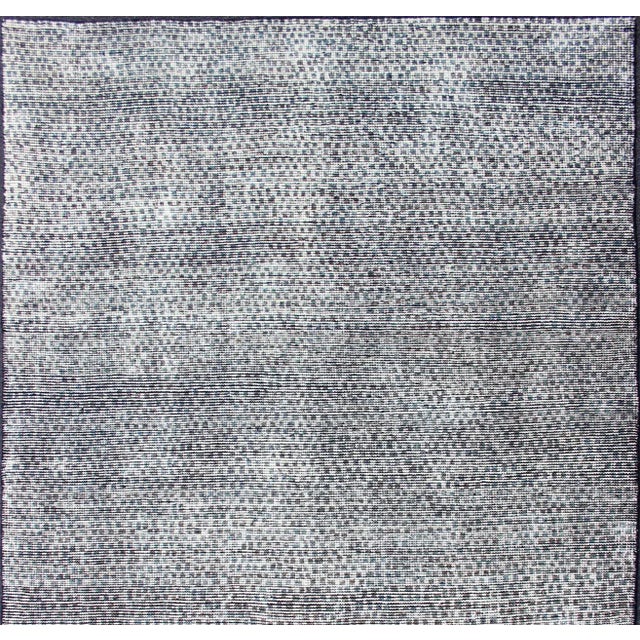 Shades of cream, light green, and charcoal modern distressed checkered designed piled rug, rug , country of origin / type:...