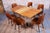 This elegant set of six Mid-Century chairs comes from Czechoslovakia from the 1950s. The chairs are made of beech wood – a...