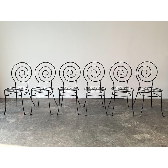 There’s something a little hypnotic about the backs on these — each one a tight, hand-formed spiral that pulls the eye in...