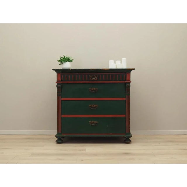The chest of drawers was made in the 1950s, Danish production. The chest of drawers is made of solid pine wood. The...