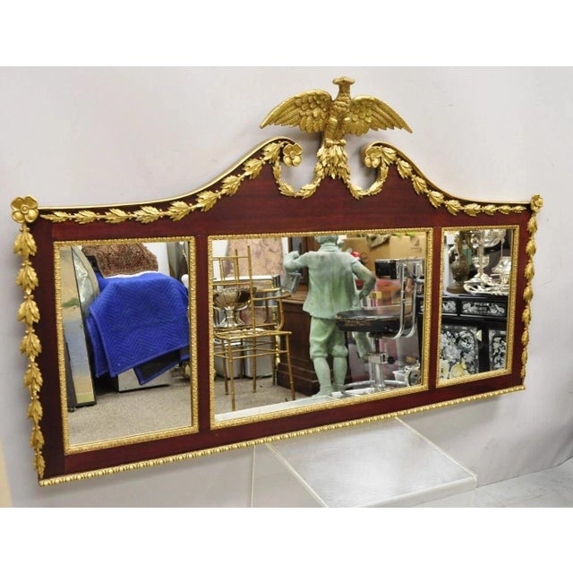 Antique American Federal Gilt Carved Overmantle Triple Mirror with Gold Eagle. Item features impressive gold gilt carved...