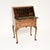 A superb antique burr walnut writing bureau, made in England and dating from the 1920-30’s. It is of outstanding quality,...