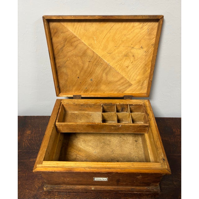 Full of charm and character, this early 20th century box offers a glimpse into the rhythms of domestic life from the early...