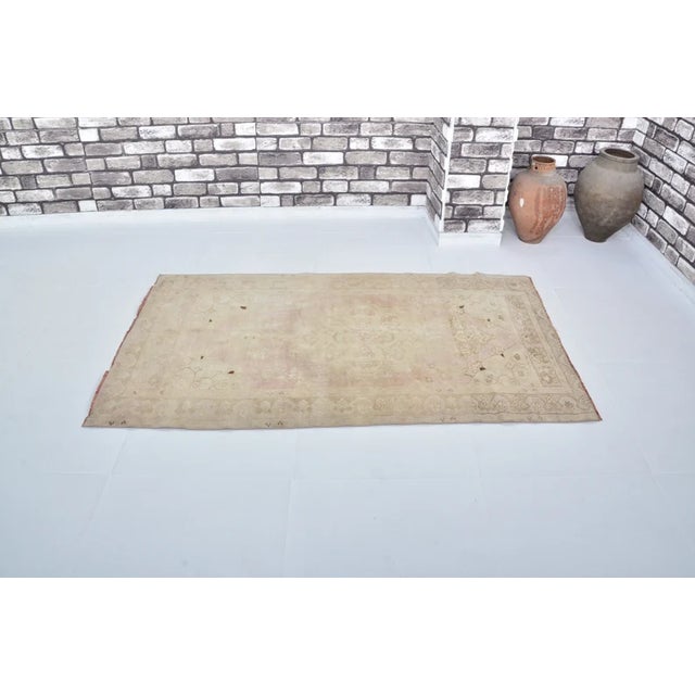 Turkish Faded Red and Beige Vintage Carpet For Sale - Image 3 of 10